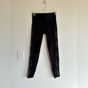 Spanx Seamless Shaping Leggings Black With Aztec Stripes on the Sides.